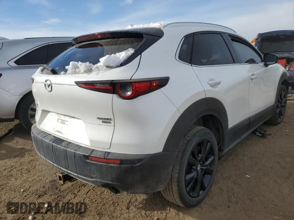 2021 Mazda CX-30 Premium with VIN 3MVDMBDY4MM308677, listed as a Copart auction lot 81869044 with 32,362 mi miles and Salvage Title. Bid and sale history available at carsss.com. Image 3.