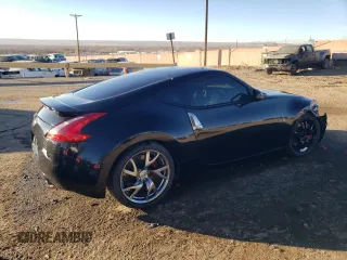 2014 Nissan 370Z Nismo z VIN JN1AZ4EHXEM632166, wystawiony jako Copart lot #88311915 z przebiegiem 18 414 mil mil oraz Szkoda całkowita • Salvage title. Historia ofert i sprzedaży dostępna na DreamBid. Obrazek 3.