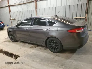 2017 Ford Fusion Hybrid SE z VIN 3FA6P0LU4HR226127, wystawiony jako Copart lot #50496455 z przebiegiem 98 027 mil mil oraz Szkoda całkowita • Salvage title. Historia ofert i sprzedaży dostępna na DreamBid. Obrazek 2.