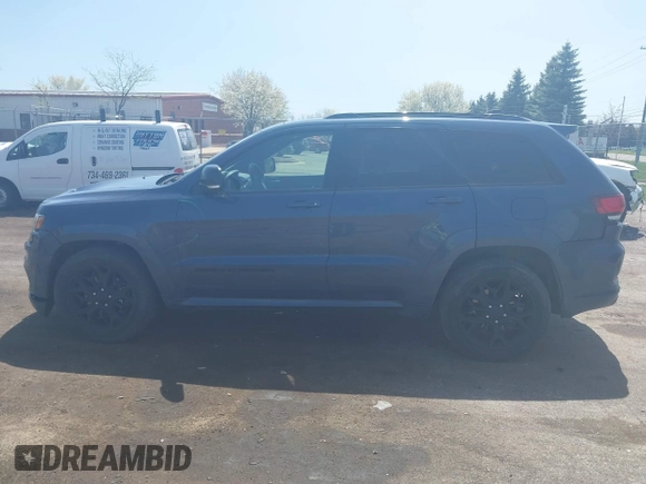 2021 Jeep Grand Cherokee Limited with VIN 1C4RJFBG2MC669487, listed as a IAAI auction lot 42066881 with 137,905 mi miles and . Bid and sale history available at DreamBid. Image 14.