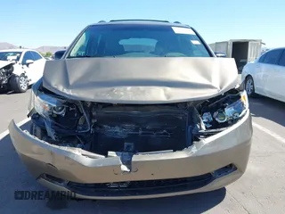 2012 Honda Odyssey EX-L z VIN 5FNRL5H63CB033049, wystawiony jako IAAI lot #42260501 z przebiegiem 165 693 mil mil oraz . Historia ofert i sprzedaży dostępna na DreamBid. Obrazek 6.