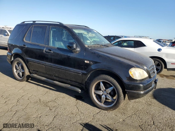 2001 Mercedes-Benz M-Class with VIN 4JGAB72E81A223281, listed as a Copart auction lot 71578344 with 112,186 mi miles and Clean Title. Bid and sale history available at carsss.com. Image 4.