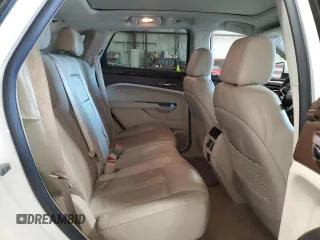 2015 Cadillac SRX Luxury Collection z VIN 3GYFNBE38FS618933, wystawiony jako Copart lot #45332835 z przebiegiem 64 819 mil mil oraz Szkody całkowita. Historia ofert i sprzedaży dostępna na DreamBid. Obrazek 11.