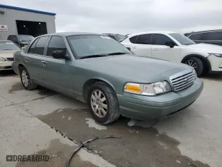 2006 Ford Crown Victoria LX with VIN 2FAFP74W66X132385, listed as a Copart auction lot 50997775 with 214,277 mi miles and Salvage Title. Bid and sale history available at carsss.com. Image 4.