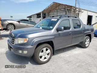 2014 Honda Ridgeline RTL z VIN 5FPYK1F53EB004694, wystawiony jako Copart lot #57222085 z przebiegiem 128 210 mil mil oraz Szkoda całkowita • Salvage title. Historia ofert i sprzedaży dostępna na DreamBid. Obrazek 1.
