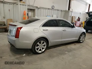 2014 Cadillac ATS Standard AWD with VIN 1G6AG5RX3E0104313, listed as a Copart auction lot 60358135 with 113,230 mi miles and Non repairable. Bid and sale history available at DreamBid. Image 3.