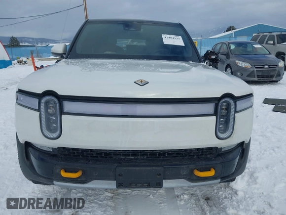 2023 Rivian R1S Adventure z VIN 7PDSGABA9PN015327, wystawiony jako IAAI lot #41484133 z przebiegiem Nie podano mil oraz . Historia ofert i sprzedaży dostępna na DreamBid. Obrazek 13.