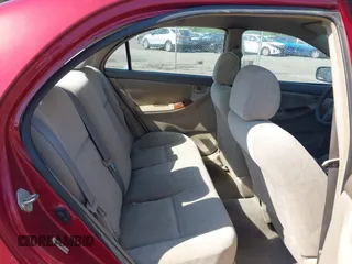 2004 Toyota Corolla CE with VIN 2T1BR32E44C296063, listed as a IAAI auction lot 42144391 with 299,999 mi miles and . Bid and sale history available at DreamBid. Image 8.