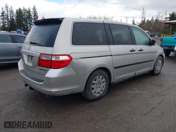 2005 Honda Odyssey LX with VIN 5FNRL382X5B029858, listed as a IAAI auction lot 41885727 with 228,607 mi miles. Bid and sale history available at carsss.com. Image 4.