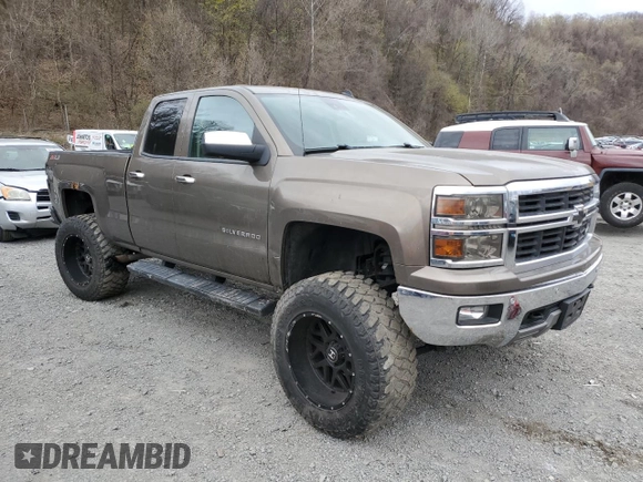 2014 Chevrolet Silverado 1500 LTZ with VIN 1GCVKSEC0EZ140325, listed as a Copart auction lot 52954845 with 128,231 mi miles and Salvage Title. Bid and sale history available at DreamBid. Image 4.