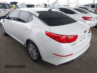 2015 Kia Optima EX z VIN 5XXGN4A71FG504390, wystawiony jako IAAI lot #42449045 z przebiegiem 171 352 mil mil oraz . Historia ofert i sprzedaży dostępna na DreamBid. Obrazek 3.