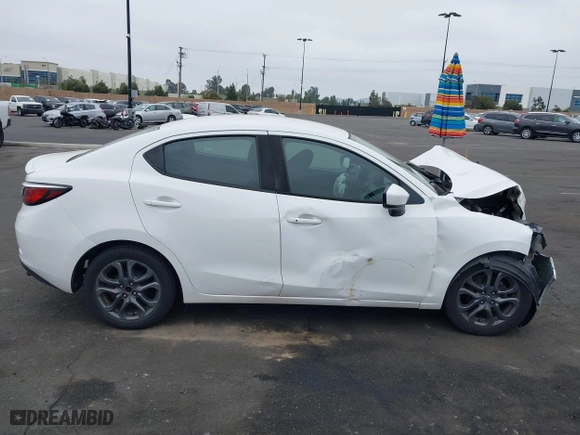 2019 Toyota Yaris Sedan L with VIN 3MYDLBYVXKY507258, listed as a IAAI auction lot 41890588 with 1 mi miles. Bid and sale history available at carsss.com. Image 12.