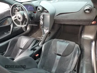 2019 McLaren 720S z VIN SBM14DCAXKW003449, wystawiony jako Copart lot #67229694 z przebiegiem 56 091 mil mil oraz Szkody całkowita. Historia ofert i sprzedaży dostępna na DreamBid. Obrazek 8.