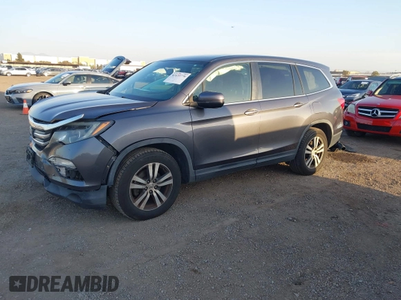 2017 Honda Pilot EX-L with VIN 5FNYF5H74HB010026, listed as a IAAI auction lot 41633770 with 170,383 mi miles and . Bid and sale history available at DreamBid. Image 21.