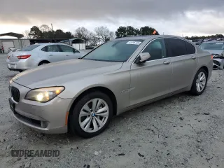 2012 BMW 7 Series 740i with VIN WBAKA4C56CDS99041, listed as a Copart auction lot 41436735 with 170,059 mi miles and Clean Title. Bid and sale history available at carsss.com. Image 1.