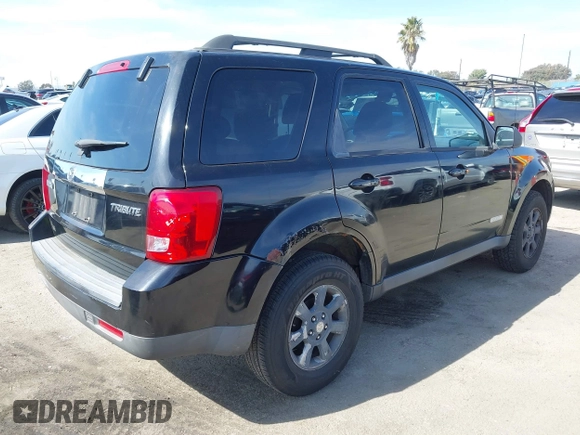2008 Mazda Tribute Sport with VIN 4F2CZ02Z68KM15550, listed as a IAAI auction lot 41615133 with 215,803 mi miles and . Bid and sale history available at DreamBid. Image 4.