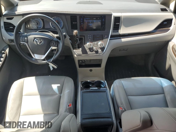 2015 Toyota Sienna XLE with VIN 5TDYK3DC4FS619385, listed as a Copart auction lot 57090385 with 112,896 mi miles and Salvage title. Bid and sale history available at DreamBid. Image 8.
