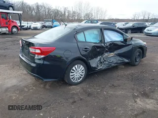 2020 Subaru Impreza with VIN 4S3GKAB69L3602396, listed as a IAAI auction lot 41621494 with 63,952 mi miles and . Bid and sale history available at DreamBid. Image 4.