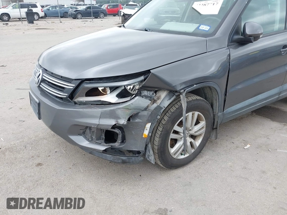 2012 Volkswagen Tiguan SE with VIN WVGAV7AX8CW004451, listed as a IAAI auction lot 42287717 with 110,167 mi miles and . Bid and sale history available at DreamBid. Image 6.