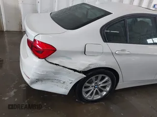 2018 BMW 3 Series 320i with VIN WBA8A9C57JAH13937, listed as a IAAI auction lot 41979917 with 268,115 mi miles. Bid and sale history available at carsss.com. Image 6.