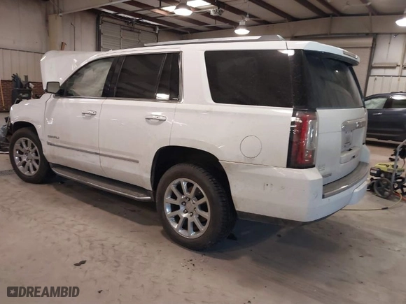 2017 GMC Yukon Denali with VIN 1GKS2CKJXHR320593, listed as a IAAI auction lot 41661230 with 1 mi miles. Bid and sale history available at carsss.com. Image 3.