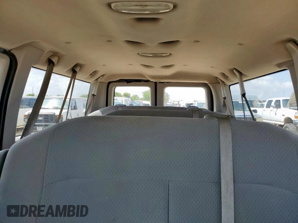 2009 Ford Econoline Passenger XL with VIN 1FBNE31L39DA56400, listed as a Copart auction lot 59878595 with 249,112 mi miles and Salvage title. Bid and sale history available at DreamBid. Image 10.