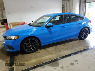 2024 Honda Civic Sport Touring z VIN 19XFL1G84RE000039, wystawiony jako Copart lot #59117875 z przebiegiem 31 474 mil mil oraz Szkoda całkowita • Salvage title. Historia ofert i sprzedaży dostępna na DreamBid. Obrazek 1.