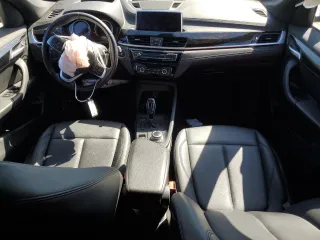 2021 BMW X1 sDrive28i with VIN WBXJG7C0XM5S33884, listed as a Copart auction lot 48413405 with 89,698 mi miles and Salvage Title. Bid and sale history available at DreamBid. Image 8.