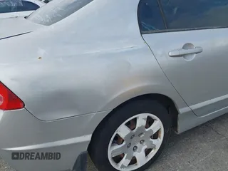 2006 Honda Civic LX with VIN 1HGFA165X6L144003, listed as a IAAI auction lot 42115624 with 310,261 mi miles and . Bid and sale history available at DreamBid. Image 16.