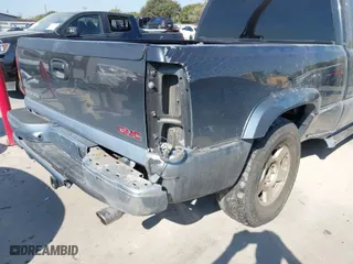 2004 GMC Sierra 1500 SLE with VIN 2GTEC19T141304318, listed as a IAAI auction lot 40534839 with 76,424 mi miles. Bid and sale history available at carsss.com. Image 16.