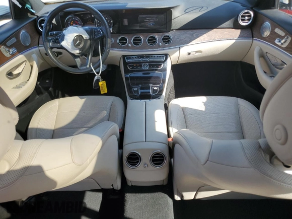 2017 Mercedes-Benz E-Class E 400 Luxury with VIN WDDZH6GB1HA135297, listed as a Copart auction lot 52133374 with 63,468 mi miles and Salvage Title. Bid and sale history available at carsss.com. Image 8.