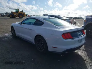 2021 Ford Mustang EcoBoost with VIN 1FA6P8TH6M5105467, listed as a IAAI auction lot 41732934 with 69,287 mi miles. Bid and sale history available at carsss.com. Image 3.