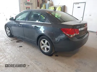 2014 Chevrolet Cruze 1LT with VIN 1G1PC5SB1E7258259, listed as a IAAI auction lot 42143073 with 101,687 mi miles and . Bid and sale history available at DreamBid. Image 3.
