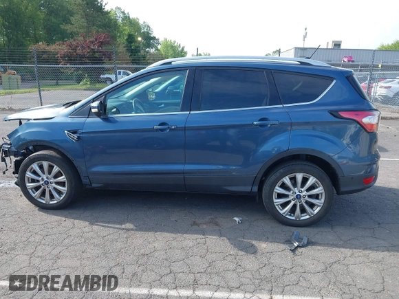2018 Ford Escape Titanium with VIN 1FMCU9J92JUB01162, listed as a IAAI auction lot 42495112 with 96,280 mi miles and . Bid and sale history available at DreamBid. Image 15.