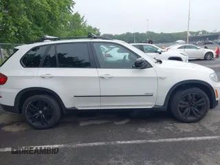 2012 BMW X5 35i с VIN 5UXZV4C5XCL765368, выставлен на аукционе IAAI как лот 42526136 с пробегом 165 365 миль миль и . История ставок и продаж доступна на DreamBid. Изображение 13.