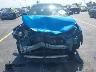 2019 Toyota C-HR XLE with VIN NMTKHMBX6KR097934, listed as a IAAI auction lot 39276687 with 56,973 mi miles. Bid and sale history available at carsss.com. Image 6.