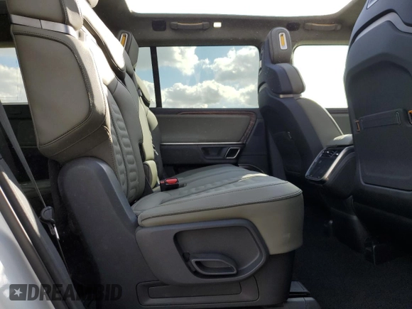 2023 Rivian R1S Adventure with VIN 7PDSGBBA3PN017791, listed as a Copart auction lot 82397374 with 20,733 mi miles and Salvage Title. Bid and sale history available at carsss.com. Image 12.