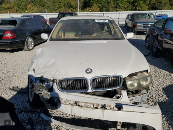 2004 BMW 7 Series 745i with VIN WBAGL63484DP68795, listed as a Copart auction lot 77201084 with 134,044 mi miles and Salvage Title. Bid and sale history available at DreamBid. Image 5.