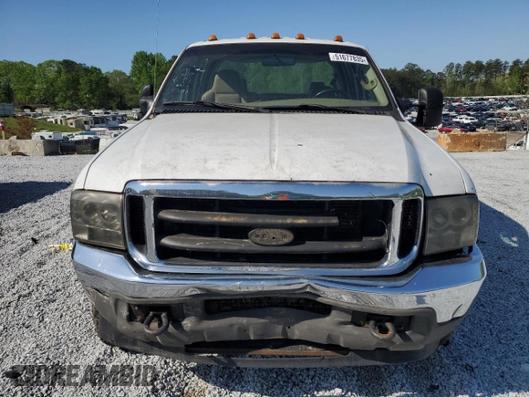 2004 Ford F-250 XL с VIN 1FTNW21L34EB63260, выставлен на аукционе Copart как лот 51677835 с пробегом Не указан миль и Списание • Salvage title. История ставок и продаж доступна на DreamBid. Изображение 5.