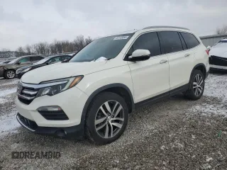2018 Honda Pilot Touring z VIN 5FNYF6H99JB028034, wystawiony jako Copart lot #45143085 z przebiegiem 70 060 mil mil oraz Szkoda całkowita • Salvage title. Historia ofert i sprzedaży dostępna na DreamBid. Obrazek 1.