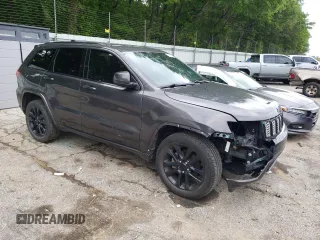2018 Jeep Grand Cherokee Altitude with VIN 1C4RJEAG0JC208506, listed as a Copart auction lot 52669915 with 159,299 mi miles and Salvage title. Bid and sale history available at DreamBid. Image 4.