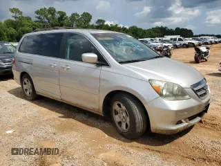 2006 Honda Odyssey EX-L z VIN 5FNRL387X6B458818, wystawiony jako Copart lot #61801335 z przebiegiem 227 179 mil mil oraz Czysty tytuł • Clean title. Historia ofert i sprzedaży dostępna na DreamBid. Obrazek 4.