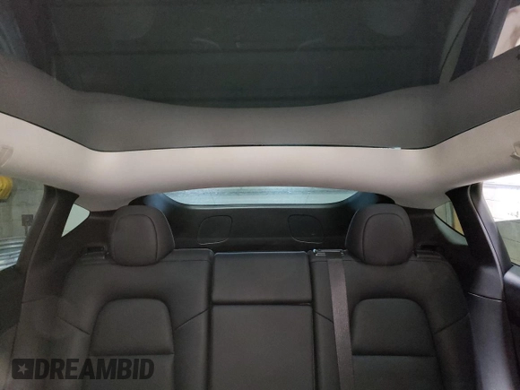 2021 Tesla Model Y Performance with VIN 5YJYGDEF2MF134700, listed as a Copart auction lot 56325685 with 66,730 mi miles and Salvage Title. Bid and sale history available at DreamBid. Image 10.
