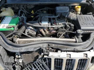 2004 Jeep Grand Cherokee Laredo z VIN 1J4GW48S24C217901, wystawiony jako Copart lot #60436675 z przebiegiem 263 837 mil mil oraz Szkoda całkowita • Salvage title. Historia ofert i sprzedaży dostępna na DreamBid. Obrazek 11.