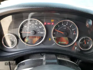 2014 Jeep Wrangler Sport with VIN 1C4AJWAG1EL200181, listed as a Copart auction lot 61165595 with 101,234 mi miles and Salvage title. Bid and sale history available at DreamBid. Image 9.