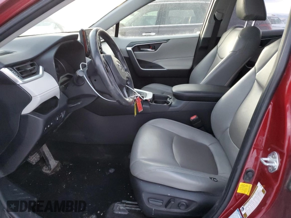 2019 Toyota RAV4 Hybrid XLE with VIN JTMRWRFV2KD035406, listed as a Copart auction lot 42767265 with 55,710 mi miles and Salvage Title. Bid and sale history available at carsss.com. Image 7.