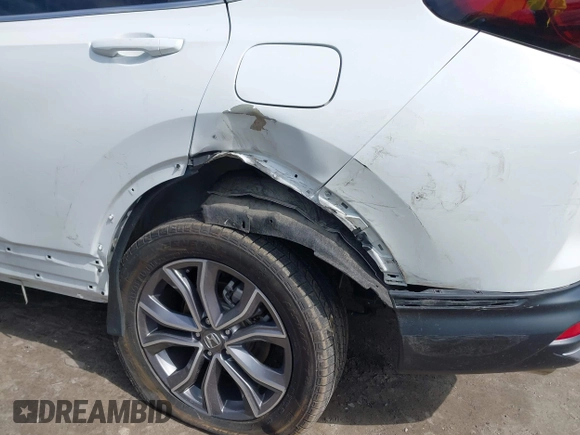 2020 Honda CR-V Touring z VIN 2HKRW2H9XLH623380, wystawiony jako IAAI lot #42039028 z przebiegiem 59 795 mil mil oraz . Historia ofert i sprzedaży dostępna na DreamBid. Obrazek 6.