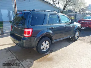 2009 Ford Escape XLT with VIN 1FMCU03709KB87490, listed as a IAAI auction lot 41989526 with 186,207 mi miles. Bid and sale history available at carsss.com. Image 4.