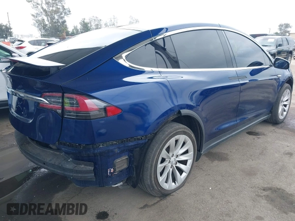 2016 Tesla Model X 70D z VIN 5YJXCBE29GF018794, wystawiony jako IAAI lot #42129574 z przebiegiem 51 814 mil mil oraz . Historia ofert i sprzedaży dostępna na DreamBid. Obrazek 4.