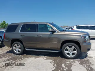 2016 Chevrolet Tahoe LT z VIN 1GNSCBKC8GR210829, wystawiony jako IAAI lot #42459936 z przebiegiem 160 518 mil mil oraz . Historia ofert i sprzedaży dostępna na DreamBid. Obrazek 14.